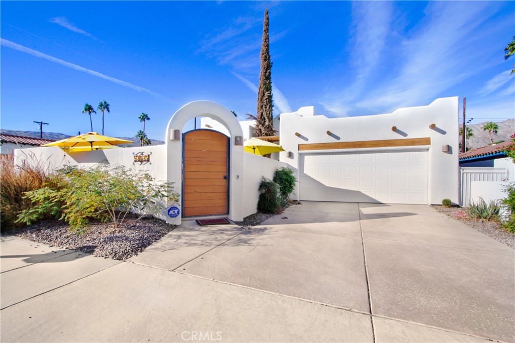 Discover the essence of desert living in this Santa Fe-style retreat nestled near the top of the highly sought after La Quinta Cove. Framed by breathtaking mountain views from nearly every room, this residence is a private haven of charm and comfort.
Step into an open-concept floor plan featuring three bedrooms and two Jack-and-Jill bathrooms—one of which includes a rejuvenating Jacuzzi tub. The oversized primary suite offers a versatile bonus space, perfect for a nursery, home office, or cozy retreat, along with a generous walk-in closet. French doors lead to the tranquil backyard oasis, complete with flowering bougainvillea, mature ficus hedges for added privacy, a large shade tree, and a welcoming pergola. The chef’s kitchen has been completely remodeled, showcasing custom marble countertops, with a bar that opens to the dining room. Top-of-the-line Viking refrigerator and stove, and beautifully refaced solid oak cabinetry. The adjacent breakfast nook invites morning light and also opens onto the serene patio. Entertain in style in the formal dining room with a gas fireplace, or step outside through the French doors to your newly resurfaced and re-tiled Sinatra-style pool and spa—the perfect setting for summer evenings, & family gatherings, makes this an Entertainers delight. Additional highlights include an interior laundry room and a location just two miles from Old Town La Quinta’s vibrant dining scene, and less than a mile from the scenic Bear Creek Trailhead.
This home isn't just a place to live—it’s a lifestyle waiting to be experienced.