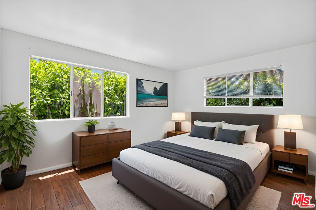 PRIME LOCATION! Welcome to this rare and stylish coastal retreat in the heart of Santa Monica! Just blocks from the beach and moments from Montana Avenue, this spacious and beautifully updated 2-bedroom, 2-bathroom front-facing condo offers the ideal combination of modern comfort, convenience, and the laid-back luxury of Westside living. Step into an open and airy floor plan bathed in natural light from oversized windows, with rich hardwood floors, recessed lighting, and a seamless flow from the living room to the dining area. The generously sized living room features a cozy fireplace and opens to a private balcony the perfect space to enjoy ocean breezes, your morning coffee, or evening sunsets.The remodeled kitchen is outfitted with sleek cabinetry, quartz countertops, stainless steel appliances, and a breakfast bar that's perfect for casual dining or entertaining.The spacious primary suite offers ample closet space and a tastefully updated en-suite bathroom, while the second bedroom is ideal for guests, a home office, or a creative studio. Additional features include central air and heat, one assigned gated parking space, and secure building entry. Perfectly located just minutes from the sand, Palisades Park, and the world-class dining, shopping, and entertainment of Montana Avenue and Third Street Promenade, this turnkey condo offers the best of coastal city living.Whether you're a discerning buyer seeking a beachside primary residence or a savvy investor looking for location and lifestyle this is the one. Don't miss this exceptional Santa Monica opportunity! This is more than a condo it's a chance to own prime real estate in one of Santa Monica's most sought-after, premium locations, where everything you love is just a stroll away.