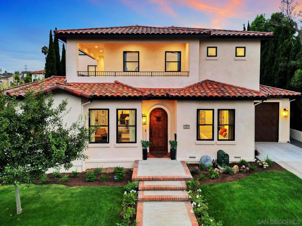 This Point Loma jewel blends sophisticated design with sweeping bay and city views. Completely reimagined and expanded in 2025, the home offers 4 bedrooms, 4 bathrooms, and over 3,400 sf of carefully crafted living space on a 7,500 sf lot centrally located just blocks from Liberty Station. The open-concept floorplan is anchored by a chef’s kitchen with handcrafted cabinetry, full-slab quartzite counters and backsplash, pro-grade appliances, and an oversized island designed for gathering. Dramatic Fleetwood glass sliders (10' - 13') open to a private interior courtyard, seamlessly blending interior spaces with thoughtfully designed outdoor living. Entertain with ease - from cooking in your courtyard to dining on the spacious rooftop terrace as planes lift off over San Diego Bay. The primary suite is a sanctuary of its own, featuring a spa-inspired bath, custom walk-in closet, and wrap-around patio. Every detail reflects uncompromising quality: hardwood floors, designer tilework, all-new systems, dual-zone HVAC, gas fireplace, and a classic tile roof. Two double garages provide rare flexibility, with one including a finished bonus room ideal for a studio, gym, or creative space. Now offered at $3,295,000, this beautifully reimagined residence presents a rare opportunity to experience elevated coastal living in the heart of Point Loma.