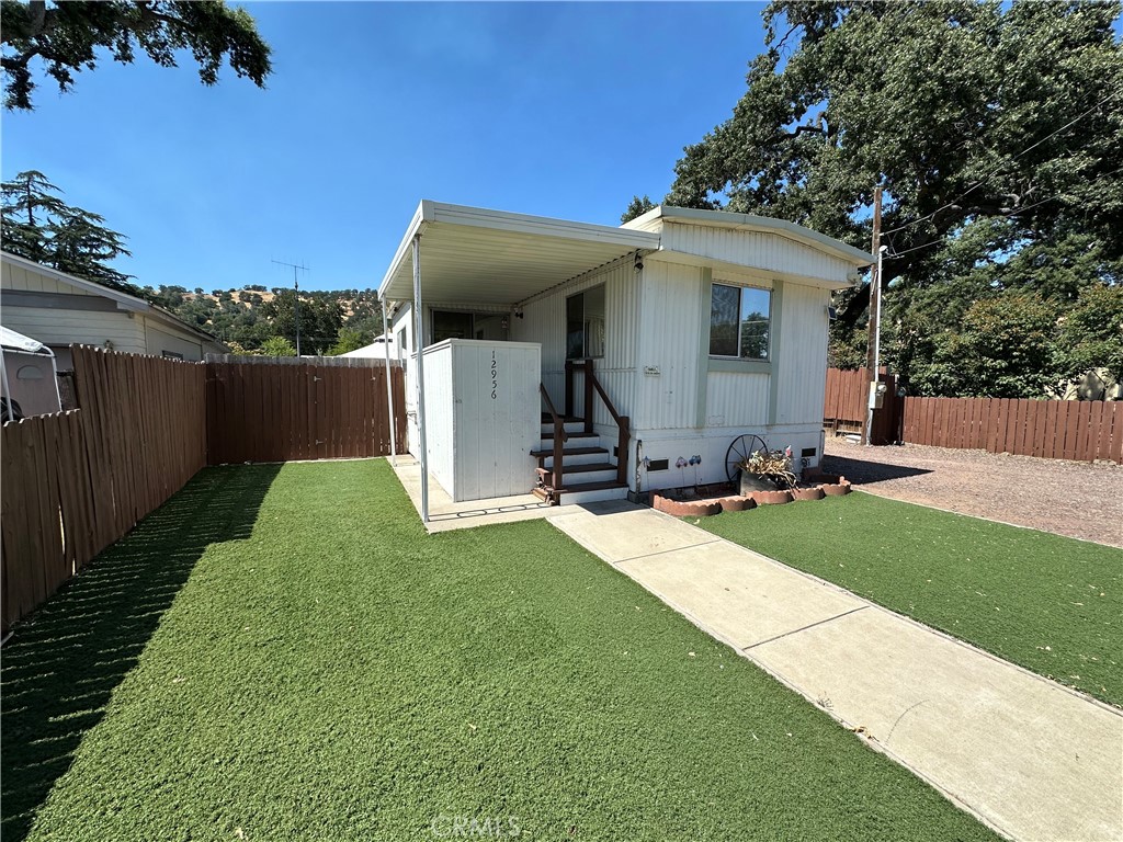 Charming Manufactured home. Enjoy living in the open floor plan. Large primary bedroom. Home has a surveillance system. Yard is fenced with private back yard to enjoy outdoor living. Above ground pool with a large shed. Deck with gazebo for entertaining.