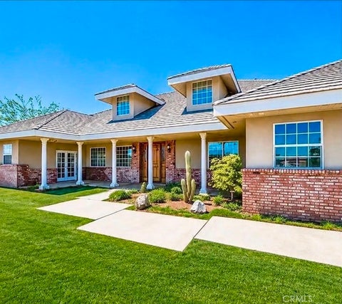 Photo of 9126 Kittering Road, Oak Hills, CA 92344 (MLS # IG26116870)