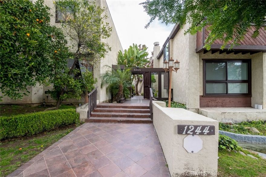 Location, elegance and all the right features! Prime Glendale location! Discover this 2-bedroom, 2.5-bathroom unit with a spacious 1,540-sqft floorplan. You are greeted with laminate and tile flooring, soaring high ceilings, recessed lighting and more. The living room showcases a dry bar, bright windows, and a fireplace, perfect for entertaining. Through the dining area you have a bright kitchen with granite countertops, nice appliances, along with a sliding door that leads you to a private patio. Two spacious, primary bedrooms, both with private bathrooms. Located in a very well-kept building with controlled access and a community pool. Close to popular dining, schools and supermarkets.