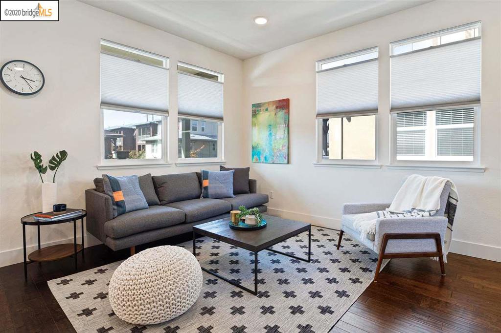 Elegant 3 bedroom, 2 1/2 bath home, built in 2017, in Alameda's West End. Drop your cares in the comfortable first floor lobby, or set your briefcase down in the office adjacent to the 2-car garage. Upstairs are the primary living and dining areas and kitchen with an oversized island. One floor up, 3 spacious bedrooms and laundry room open off of a wide corridor with built-in storage and a view to the floor below. This home has an open floor plan, plenty of sunlight and space, an unusually large balcony for indoor/outdoor entertaining, ample storage, high quality interior finishes like expansive hardwood floors and Berber style carpets. It sits in a wonderful neighborhood on a dead end street, well off the main thoroughfare. The home fronts onto a nearly fully enclosed courtyard where neighbors often greet each other coming and going. Enjoy proximity to Alameda Landing amenities, easy access to the SF Ferry, dntn Oakland & BART, new greenbelt & Estuary park. Legal TH lives like SFR.