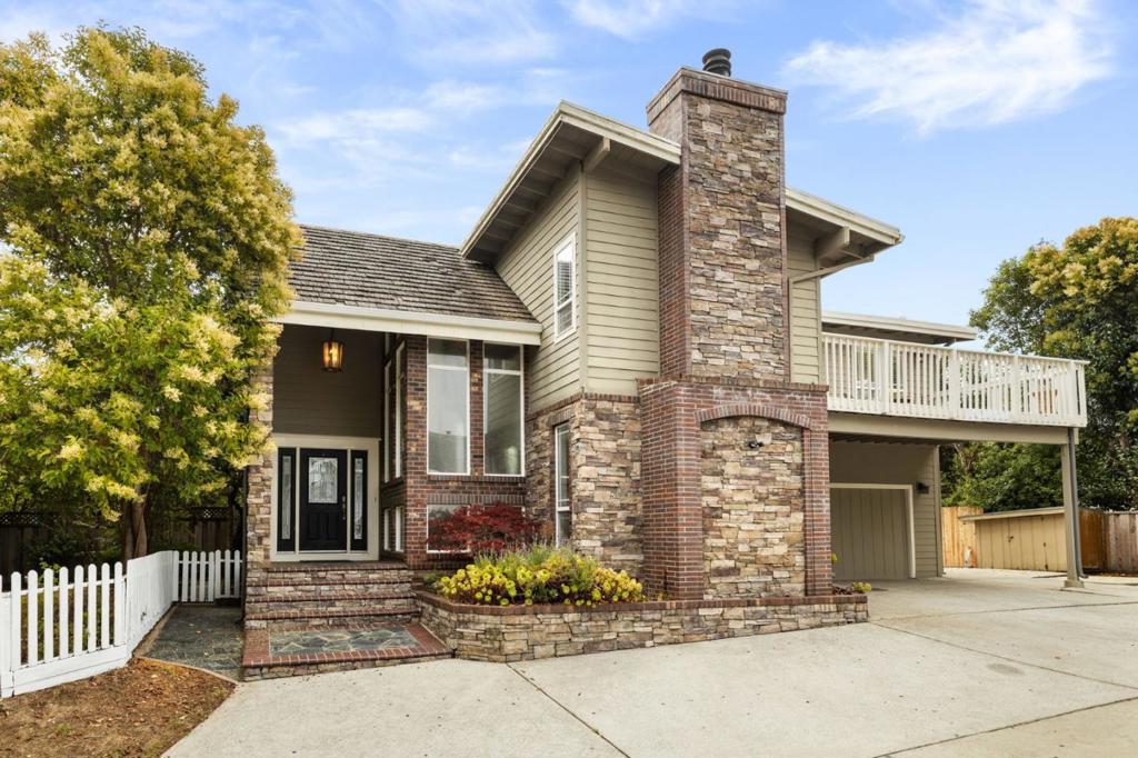 Experience the perfect blend of comfort and convenience in this stunning 1900+- sq ft home, nestled in the sought-after Rio Del Mar neighborhood. Set back from the street, this property offers privacy while being just a short distance from Seascape Golf Course, Rio Del Mar Beach, world class surf, fine dining, wine tasting, & local shops. Inside, abundant natural light fills the open-concept living areas, enhanced by beautiful hardwood floors and fresh carpeting in the three bedrooms. The kitchen is equipped with bar seating areas and a cozy breakfast nook, ideal for casual meals. The spacious family room, centered around a large fireplace, provides a relaxing space for both quiet moments and gatherings. Step out onto the expansive balcony off the living room, perfect for BBQs, enjoying morning coffee, or simply unwinding. The property also boasts a fully fenced yard with mature landscaping, a spacious two-car garage, and a large side yard offering additional space. With a perfect mix of coastal charm and modern amenities, this home is one you won't want to miss!