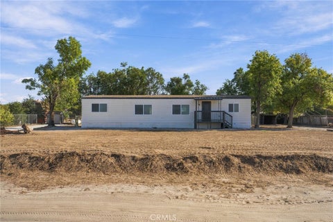 Photo of 31619 Wolfskill AVE, Nuevo, CA 92567 (MLS # IV26203480)