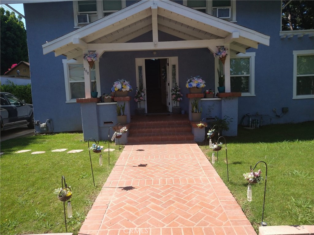 Don't miss this rare opportunity to own a beautifully updated 5-bedroom, 2-bathroom home directly across the street from the iconic Bowers Museum! This charming two-story residence with a basement has been rehabbed within the past 5 years and is ready for you to move in and make it your own. Step inside to discover a modern, comfortable living space featuring new laminate flooring throughout the living room, hallways, and bedrooms. The kitchen and bathrooms have been fully upgraded with stylish tile floors and granite countertops, offering a sleek and functional space for cooking and entertaining. Enjoy peace of mind with new plumbing and electrical wiring throughout the entire home, as well as a newer roof (just 5 years old). The home has also been recently painted and features new windows and doors for improved energy efficiency and curb appeal. Spacious two-car detached garage, Large backyard with plenty of space for extra parking or outdoor activities Prime location near parks, dining, and cultural attractions. With five bedrooms (Title shows Four Br, (Buyers and agents to conduct their own Due Diligence Investigations), updated systems, and a generous lot, this property offers both space and modern convenience in a highly desirable location. Perfect for a growing family, multi-generational living, or even an investment opportunity!
