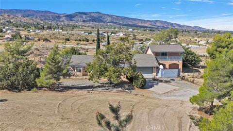 Photo of 3789 Hollister Rd, Phelan, CA 92371 (MLS # HD26211374)
