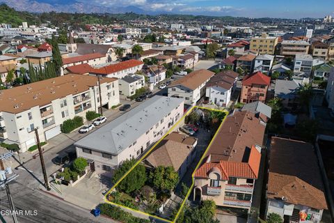 Photo of 638 N Bunker Hill Avenue, Los Angeles, CA 90012 (MLS # 226002163)