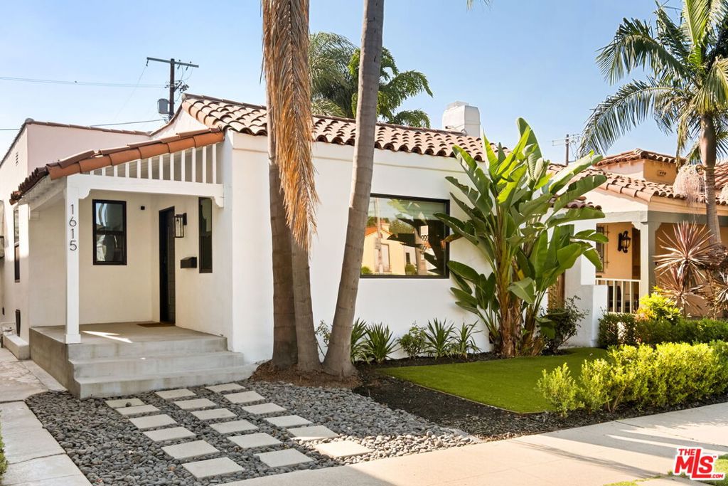 Tucked along a serene tree-lined stretch on Crescent Heights Blvd, this Beverlywood-adjacent, exquisitely remodeled home combines timeless character with high-end upgrades. The inviting living room features cathedral ceilings, fireplace, and beautifully maintained original hardwood floors. A gourmet kitchen showcases Italian marble countertops, Viking appliances, and a charming bay window that floods the room with natural light. In addition to the main residence is a spectacular fully permitted ADU with its own address and entrance. Completed in 2024, this stylish and versatile space offers a kitchen with gas hookups, bathroom, and mini-split HVAC; perfect for guests, a home office, or income potential. Outside, a backyard oasis awaits with mature greenery, including an orange tree, and privately gated parking for two side-by-side vehicles. A centrally located jewel that combines effortless access to Beverly Hills, Century City, Culver City, and all the dining and shopping the Westside has to offer.