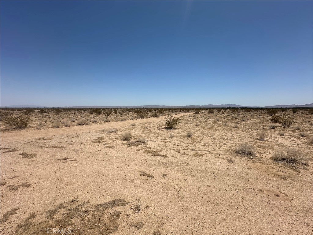 Spacious 2.5-Acre Parcel in the Heart of the High Desert - A Smart Investment or Private Escape! Discover the possibilities with this 2.5-acre flat lot located in the fast-developing area of Lancaster's west side. Whether you're looking to build your dream home, start a small ranch, or invest in land for the future, this parcel offers space, privacy, and opportunity at an affordable price. Located near Lake LA, this property provides beautiful desert views, wide-open skies, and plenty of room to grow. With other rural homes and ranches in the area, this could be the perfect place to build or hold as a long-term asset. Zoned for residential/agricultural use (buyer to verify) Room for a home, workshop, animals, or storage Electric nearby - buyer to verify all utilities Easy access via dirt roads Peaceful surroundings with potential for amazing sunrise/sunset views Whether you're a builder, investor, or outdoor enthusiast, this property gives you the freedom to shape your vision. No HOA and no time limit to build. Contact us today for directions and more info—don't miss your chance to own land in beautiful Palmdale, CA!
