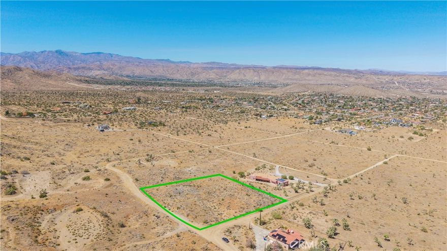 Spacious 2.014 acre parcel available in Yucca Valley’s sought-after Upper Sky Harbor area. This buildable lot offers lovely views and plenty of room to create your dream home in a desirable location. The property sits near the entrance to Joshua Tree National Park, giving you quick access to world-class hiking, climbing, and stargazing. Just minutes away, enjoy the shops, dining, and events in downtown Yucca Valley and Joshua Tree, or head to Pioneertown and catch live music at the legendary Pappy & Harriet’s. Whether you’re planning a private residence or considering the potential for a short-term rental, this parcel provides an excellent opportunity in one of the High Desert’s most popular destinations. Buyer to verify utilities and zoning.