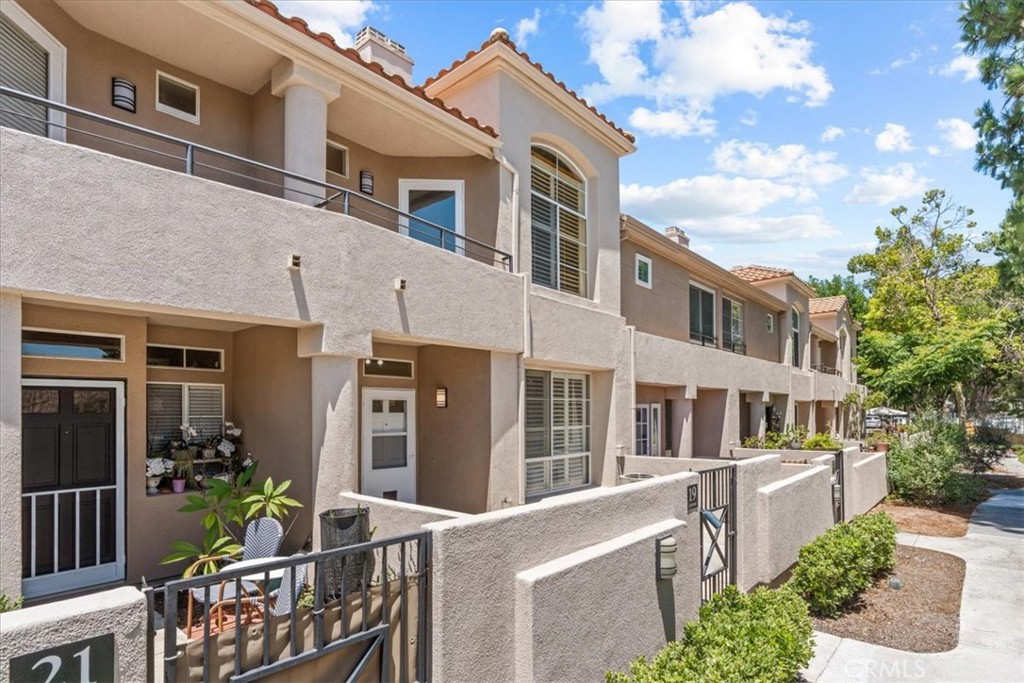 Total remodel just completed, Welcome to the highly sought after community of Windsong in Aliso Viejo. All new paint, flooring, counter tops, new bath vanities, mirrors, door hardware. This light and bright home features a modern open floor plan plus a serene private patio with a view of South Orange County. Spacious living and dining areas, cozy fireplace downstairs and in primary bedroom plus 2 closets in primary bedroom with tall ceilings. This home is located in a gated community with resort like amenities including, pool, tennis, pickleball courts. play ground, and walking paths. This home has very convenient access to the 73 freeway, public parks, and biking trails and a short drive to the beach. Shopping is a breeze with 99 Ranch Market and Trader Joe's is a short drive.