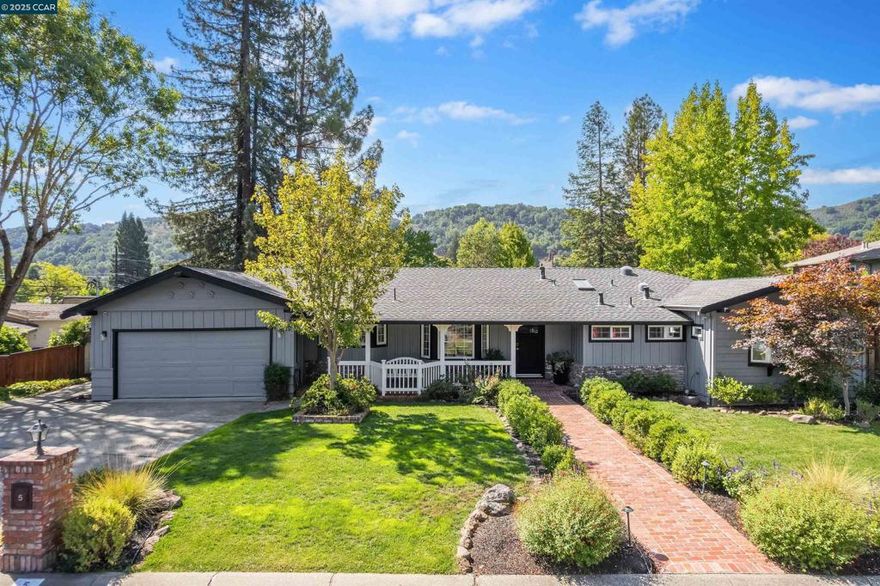 Experience 12 years of education excellence just steps away from this Ivy drive single level ranch with sought after cul-de-sac location! Nestled on a flat .23-acre lot in Orinda’s beloved Ivy Drive neighborhood, this beautifully updated single-level ranch combines comfort, function, and timeless charm. Inside you’ll find 2,601 sq ft with 4 spacious bedrooms plus a dedicated home office, 3 full baths, and a 2-car attached garage. The thoughtfully designed floor plan offers excellent flexibility for modern living. The heart of the home is an open, expansive kitchen/great room with vaulted ceiling, fireplace, hardwood floors, and sliding doors to the backyard - perfect for entertaining or casual everyday living. A separate living and dining area create space for more intimate gatherings, while the 4th bedroom and office are set apart from the primary bedroom wing for guests and work-from-home privacy. Outdoor living shines: a welcoming covered front porch, a private backyard with paved patio, lush lawn, mature landscaping, and an irrigated vegetable garden. Host friends around a fire pit, dine al fresco, or simply enjoy peaceful evenings under the stars. All this is just steps from Orinda’s award-winning K-12 schools - a true Ivy Drive lifestyle.