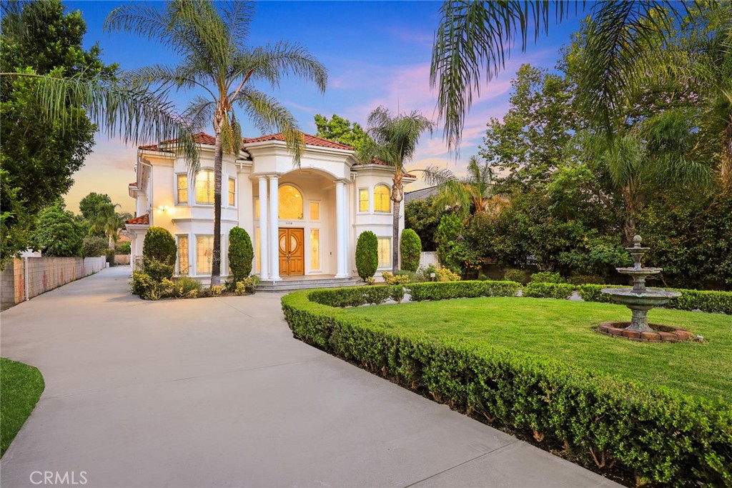 This Gorgeous  &  Elegant 2 story custom estate located on Beautiful and Quiet neighborhood with distinguished Arcadia School District. It features private security gated, stately 2 column studded entrance leads to a grand foyer under cathedral ceiling featuring a magnificent crystal chandelier. Downstairs of the main house: wood-paneled library; marble-floored living room; large newly remodeled built-in shelf for ample storage spaces . Family room with a newly build wet bar connected to the fully remodeled gourmet kitchen behind dining room and a fully remodeled separate wok kitchen.  2 bedroom suites, plus a 1/2 bath as the powder room for guest. Upstairs: 2 hard wood staircases connected downstairs; 4 bedroom-suites with common area for study or recreation; Jacuzzi tub, steam room, 3 walk-in closets and retreat area inside the master suite against with beautiful view of San Gabriel mountains. Palm trees surround the detached guest house(1500 sqft) with permit  for entertainment ,  Sparkling pool and water fountain. Refinements such as marble, stone, custom-made cabinetry, drapes and built-ins are evident throughout with many stained-glass windows. Front yard features circular driveway and garden with year-round roses and fruit trees. 3-car attached garage plus plenty of car parking space. Walking distance to schools, super-market and multi-cultural eateries. A Great opportunity to own this Luxurious Home !!!