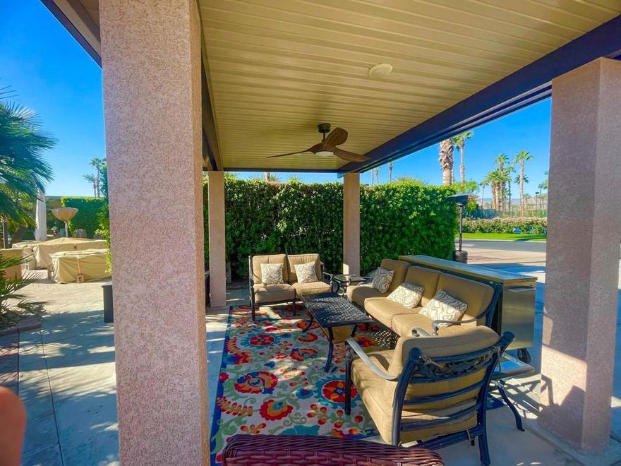 Enjoy the ultimate resort lifestyle on this prime golf course lot, perfectly positioned on the 6th hole with stunning views of the lake, fountain, and picturesque bridge. Located directly across from the pool, pickleball courts, clubhouse, and cafe, convenience is at your doorstep--no golf cart needed! Start your mornings with coffee by the greens as the sun rises, and end your day with a cocktail around the cozy propane fire pit, taking in the beauty of the desert sunset. The lot's desirable east-to-west orientation provides the perfect balance of sun and shade throughout the day, creating an inviting and relaxing atmosphere.Designed for both comfort and entertainment, this lot comes fully furnished with a spacious dining table for six, a fire pit table with chairs, a comfortable couch and two sofa chairs, as well as additional seating at the lot entrance under a large umbrella. The well-equipped outdoor kitchen features tiled countertops, a full-size BBQ, a brand-new four-burner stove with an oven, a sink, refrigerator, and a fully stocked bar with stools--perfect for hosting friends and family. Nestled in a quiet location, this exceptional lot offers a serene escape with all the luxuries of resort living at your fingertips.Outdoor Resort Indio is a Class A only RV resort in Indio, CA.