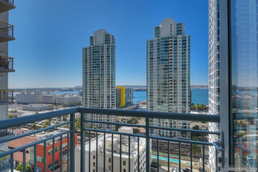 Light-filled and beautifully updated, this 17th-floor west-facing two-story home at Treo offers incredible sunset and city views. The spacious layout features dual primary suites upstairs, each with its own en-suite bath, and a convenient half bath on the main level. Enjoy elegant cherry wood floors, granite countertops, and an open living space perfect for relaxing or entertaining. This home also includes two assigned underground parking spaces and a private storage cage. Treo provides resort-style amenities including front desk security, onsite management, a sparkling pool and spa, fitness center, community lounge, and more—all in one of downtown’s most desirable locations.