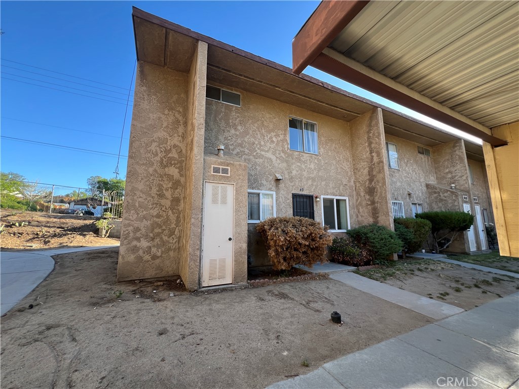 Great property for first time buyer or investor. Low priced affordable living two bedroom two and a half bathroom condo in La Paz Townhomes community in Victorville. This Condo is 1,080 square feet and has two levels, it needs some work for the buyers to make it their own. The main floor features the kitchen and living room plus a half bathroom for guests. The second floor has two spacious sized bedrooms with one bathroom as well, indoor laundry and a balcony at the front of the unit. There is carport, two spaces with two storage units. Close to the freeway and close to stores. The HOA covers water, sewer, trash and grounds maintenance. Great potential property for investors or first time home buyers. Community is not approved for FHA loan financing. Make an offer, seller is motivated.