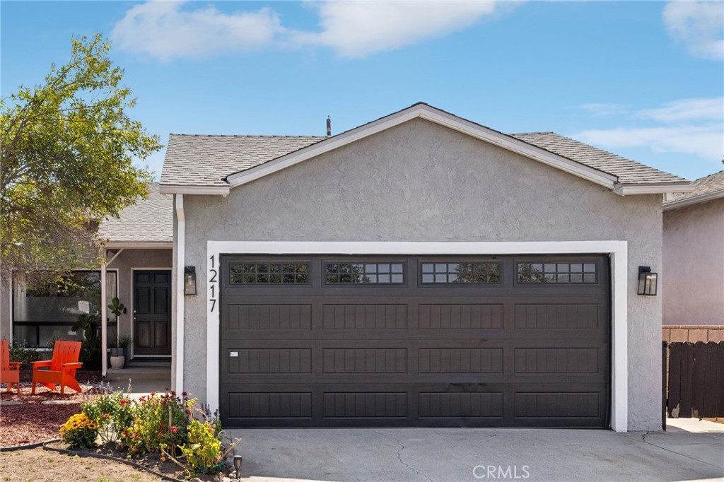 Discover the perfect blend of classic charm and modern convenience in this beautifully updated 3-bedroom, 1.5-bathroom home, nestled in the heart of Burbank’s coveted Magnolia Park neighborhood. Spanning 1,212 square feet, this move-in-ready residence offers a warm and inviting atmosphere, ideal for families, professionals, or anyone seeking the quintessential Burbank lifestyle. Step inside to a bright and airy living room, where a cozy fireplace serves as the centerpiece, complemented by gleaming new floors that flow throughout the home. The kitchen is a delight, featuring brand-new stainless steel appliances (refrigerator, stove, and dishwasher), sleek countertops, and stylish backsplash. A cozy breakfast nook adds a charming touch, perfect for morning coffee or casual meals. The primary suite provides a serene retreat with an updated bathroom, while two additional generously sized bedrooms offer ample space for family, guests, or a home office. Outside, the spacious backyard is a true highlight, providing plenty of room for family gatherings, barbecues, or future expansions like a pool or additional living space. Freshly landscaped grounds enhance the home’s curb appeal, making it a standout in the neighborhood. A large two-car garage offers abundant storage, adding practicality to this already impressive property. Recent upgrades, including a new roof and tankless water heater, ensure energy efficiency and peace of mind for years to come. Perfectly situated, this home is steps from the scenic Chandler Bike and Walking Path and just minutes from the vibrant shops, restaurants, and cafes of Magnolia Park, including local favorites like Coral Cafe and Ugly Mug. Families will appreciate the proximity to top-rated schools in the highly sought-after Burbank Unified School District, including Bret Harte Elementary, Luther Middle School, and John Burroughs High School. Welcome to 1217 N California, where timeless charm meets modern comfort in one of Burbank’s most desirable neighborhoods!