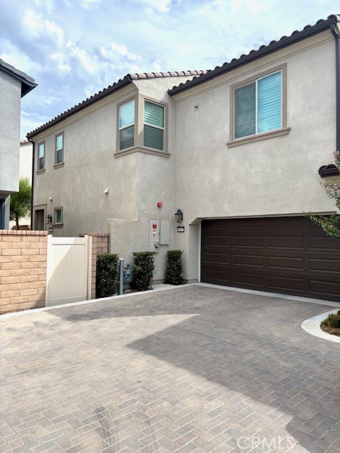 Welcome to this stunning 2 story detached condo nested in the highly sought-after master planned community called "The Preserve". This amazing end unit detach condo is located in the inner street which has privacy and quietness. And it is walking distance to its full spectrum amenity. This impeccable home combines stylish modern living, comfort and convenience plus many upgrades throughout, including: Smart home features, Luxury vinyl Wood Planks all through out the whole interior, custom shutters through out, recessed lighting, best of all *** SOLAR*** for possible zero electric bills!!! Step in to this inviting open concept floor plan provides ample natural light, making every space feel airy and inviting. Practical & Functional storage spaces featuring a large pantry by the kitchen area and a his & her separated walk-in closet in the master bedroom. Besides the 3 bedrooms, there is a loft on the 2nd floor serve as a multipurpose area. Enjoy your summer nights in the large backyard by the dining room. Beyond the home, You will get to enjoy the exclusive resort style amenities featuring pools, spas, exercise room, party room, picnic/BBQ areas, tennis, basketball court, pickle ball and baseball field. Many parks and play grounds through-out the Preserve community. This is the only community in city of Chino assigned to the top rated Chino Hills High School. Don't miss out perfect opportunity to explorer and experience this "Home Sweet Home"