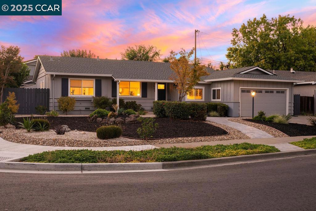 Welcome to Ygnacio Woods! This inviting 3-bedroom, 2-bathroom home offers 1,648 square feet of thoughtfully designed living space in one of the area’s most desirable neighborhoods. Well cared for and updated over the years, the home balances classic comfort with modern convenience. Inside, you’ll find both formal and casual living areas that flow naturally from room to room. The updated kitchen features a dining nook for everyday meals and a separate dining area for larger gatherings. A gas insert fireplace with a tasteful tile surround creates a warm focal point for the main living space. The primary bedroom provides a peaceful retreat, while two additional bedrooms offer flexibility for guests, a home office, or hobbies. Both bathrooms have been updated with practical, timeless finishes. The backyard is perfect for outdoor living, with beautifully landscaped grounds and a spacious patio ideal for entertaining or enjoying a quiet evening at home. Located just minutes from BART, shopping, top-rated schools, and the scenic Lime Ridge Trail, this home offers a wonderful blend of neighborhood charm and everyday convenience. Move-in ready, it’s a great opportunity in one of Concord’s most sought-after communities. Come see today!