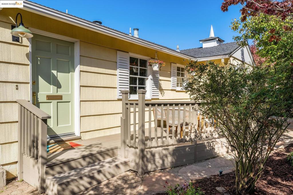 Charming 3-bedroom, 1-bathroom residence on a sunny corner lot with a wrap-around yard and mature garden for added privacy. Enjoy the convenience of a one-car garage plus proximity to Del Norte BART, shops, and parks. Perfect blend of comfort and location!