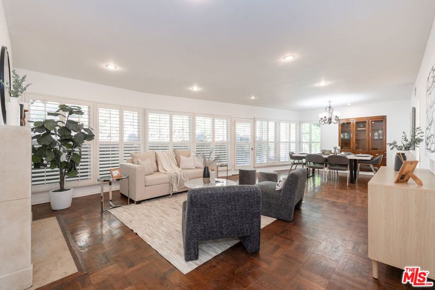 Just minutes from Sunset Blvd, this fully gated, single-story 3 bed/2 bath home offers exceptional privacy, comfort, and style. The tranquil yard features lush landscaping, a beautiful fountain, and multiple outdoor seating areas, creating a seamless indoor-outdoor lifestyle.The living room centers around a grand fireplace and flows effortlessly into the formal dining area. The updated kitchen offers modern amenities and a charming breakfast nook. One guest bedroom is ideal for visitors or a home office, while another bedroom and the primary suite open to a spacious side yard through elegant French doors. The primary suite also features an ensuite bath and a serene, retreat-like ambiance.Set on a sprawling half-acre lot, the property provides ample space for expansion or future development, allowing flexibility to further enhance and personalize the home. Whether as a full-time residence or a wonderful pied--terre for those who split their time elsewhere, this property offers the feeling of a private retreat with convenient access to The Glen Centre and the Golden Triangle of Beverly Hills.  Also for SALE! PROPERTY IS COMPLIANT WITH EMERGENCY ORDER GUIDELINES.