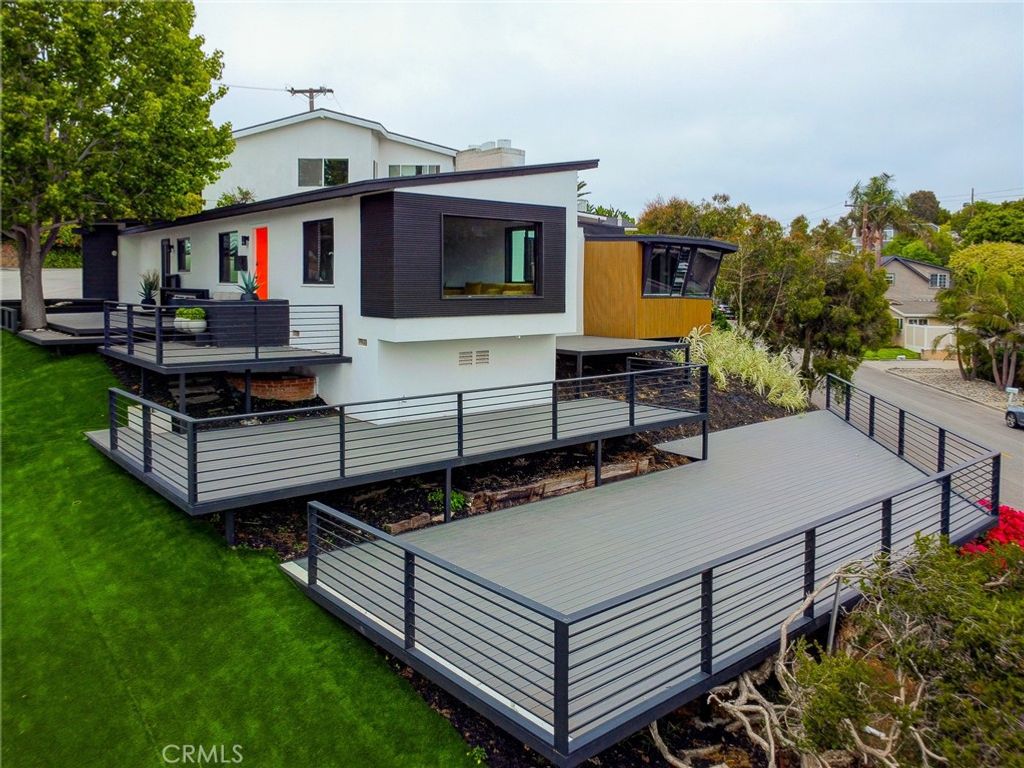 Photo of 300 Holmwood Drive, Newport Beach, CA 92663 (MLS # OC26033125)