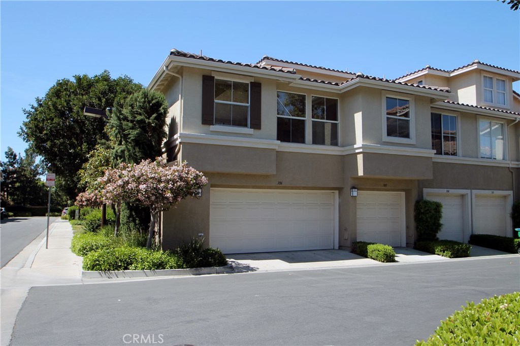 Fantastic carriage unit w/premium corner location. Single level over your own 2 car garage. No one above or below you. 1 BEDROOM + DEN (2nd bedroom currently open as a Den w/no door or closet. will not be closed off), 2 Full Baths, Open & Bright floorplan w/great room & dining room open to all white kitchen w/center island. ALL NEW STAINLESS STEEL APPLIANCES BEING INSTALLED SEPT.5 INCL REFRIGERATOR, MICROWAVE, DISHWASHER & RANGE. Cathedral ceilings, all laminate wood floors & 5" baseboards throughout, New Interior Paint. Sunny master suite w/ceiling fan, walk-in closet, custom closet organizers & large bath w/roman tub, custom cabinets in garage for tons of added storage, Shows great. Private, Gated community w/excellent amenities including full, exercise fitness center, pool/spa & tennis courts. Walk to Gelson's shopping center. Conveniently close to Irvine Spectrum. Will consider cat or small dog as pet w/increased rent.