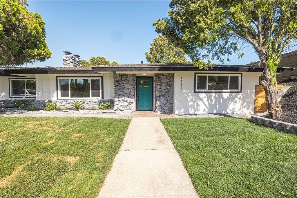 Stunning Remodeled Home with Private ADU in Prime Loma Linda Location! Welcome to this beautifully upgraded 4-bedroom, 4-bathroom property in one of Loma Linda’s most desirable and quiet neighborhoods. Featuring a spacious 3-bed, 3-bath main home plus a private 1-bed, 1-bath ADU with its own entrance, kitchen, and bathroom — this is a rare live + invest opportunity. Step inside to an open-concept layout with luxury vinyl plank flooring, quartz countertops, new dual-pane windows, and modern finishes throughout. Every detail has been thoughtfully renovated for comfort and style. The ADU offers incredible flexibility — perfect for rental income, multigenerational living, or a private workspace. Enjoy a huge backyard, a 2-car garage, and a location just minutes from Loma Linda University, hospitals, and major conveniences. Whether you're looking for a forever home, an investment, or both — this one checks all the boxes.