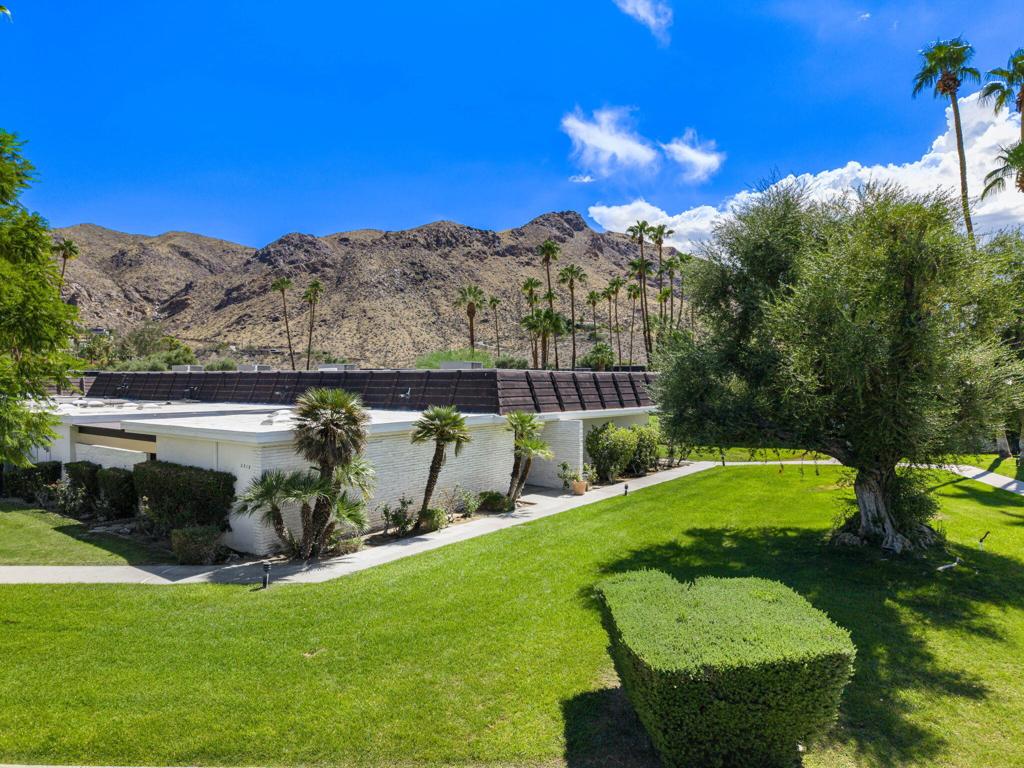 Rarely Available and Architecturally Significant, this stunning Mid-Century Modern meets Hollywood Regency style home was designed by the iconic John Elgin Woolf. Built in 1971, one of only three communities in the desert designed by Woolf, this property exudes character and charm This home offers 3 spacious en-suite bedrooms and 2,466 sq ft of sophisticated living space. Nestled beneath the desert mountains in a Private Enclave of 26-homes and spread across 10 meticulously maintained acres, Marabelle Estates has some of the most Breathtaking Mountain views in all of the desert. Walls of glass and Dramatic high ceilings flood the interior with natural light, seamlessly connecting indoor and outdoor living. Enjoy a private atrium patio, perfect for relaxing or entertaining. This home features Generously sized rooms, well-appointed kitchen w/plenty of storage and walk-in pantry, complemented by a wet bar, skylights, walk-in closets, and private laundry room. Community amenities include two pools, spas, and tennis court, all set in Lush, Resort-style surroundings. Just minutes to premier shopping, dining, and everything Palm Springs has to offer.