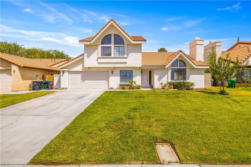 Welcome to this stunning 5-bedroom - with 2 bedrooms downstairs - completely customized home in Quartz Hill, and now at an even better price! Every detail of this home has been meticulously remodeled, featuring brand-new custom kitchen cabinets, elegant quartz countertops, and top-of-the-line appliances. The home also has all-new laminate flooring throughout the living spaces, and the bathrooms are finished off with stylish floor tile and custom tub and shower surrounds. All the lighting fixtures are updated and new, and can lighting in the kitchen provides brightness, while the above cabinet lighting is very subtle. The upstairs loft provides extra space potentially for kids' play space or an in-home office. This home has been freshly painted both inside and out, and a full block wall encloses the property offering privacy. The expansive backyard features a full-width patio cover and custom curbing, ready for your own landscaping vision. Perfect for entertaining and comfortable living!