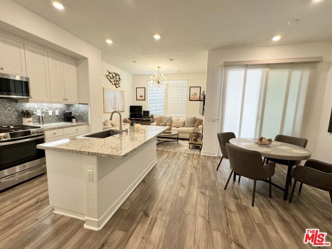 Photo of 26976 Prospector Road #203, Valencia, CA 91381 (MLS # 26848903)