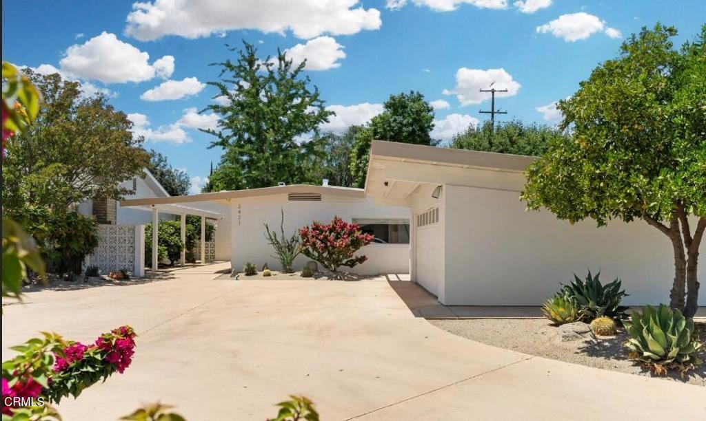 Mid-Century Modern Oasis--A Palm Springs-Inspired Time Capsule. Welcome to a stunning mid-century modern retreat in the heart of Bakersfield, radiating effortless style & charm of a Palm Springs getaway. This 2-bedroom, 2-bath home has original mahogany cabinetry meticulously restored to its glory & an abundance of natural light. The living room is inviting & iconic, w/mahogany built-ins & dramatic Pumice stone fireplace. The updated kitchen boasts crisp quartz counters & custom window shades, while thoughtful storage solutions are seamlessly integrated throughout the home. Step outside to experience a landscape designed w/intention--both front & back yards are finished w/decomposed granite, deep root irrigation & drip systems. A collection of desert-friendly plants & 7 mature fruit trees (2 lemon, 2 orange, 3 grapefruit) provide beauty & bounty, custom teak wood gates. Newer dual pane windows, HVAC, water heater, copper plumbing. More than a home--this is an architectural statement.