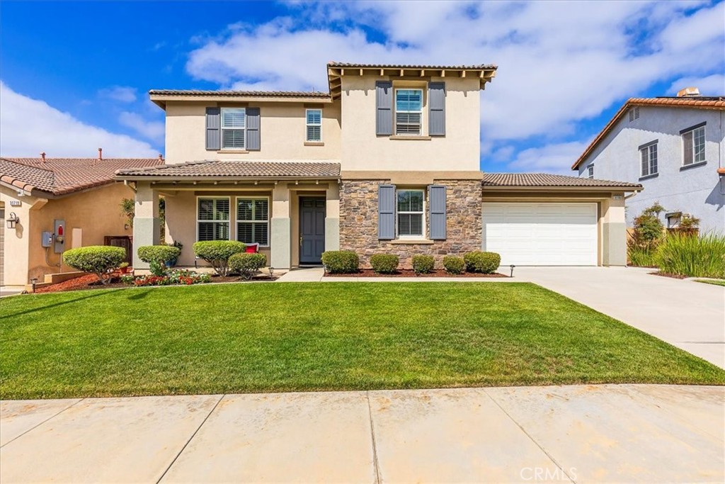 Welcome to this meticulously cared-for and impressively spacious home nestled in a quiet cul de sac. From the moment you arrive, you’ll be struck by the pride of ownership and pristine condition of this residence. Every detail has been thoughtfully maintained to create a clean, inviting, and move-in-ready sanctuary. This expansive home offers generous living spaces perfect for both entertaining and everyday comfort. Natural light floods the interior, highlighting the open floor plan and creating a warm, airy ambiance. The kitchen is well-appointed with updated quartz countertops, a walk-in pantry, massive center island, ample storage, and flows seamlessly into the oversized living room. Optional fifth bedroom conveniently located downstairs with a full bathroom. Step outside to enjoy panoramic views that stretch across the valley, perfect for morning coffee or evening sunsets. Whether you're relaxing in the beautifully landscaped yard or hosting friends and family, the outdoor space is an absolute showstopper.
Upstairs, enjoy four spacious bedrooms, three with walk-in closets. Two of the bedrooms are connected by a convenient Jack and Jill bathroom. The primary suite offers dual sinks, double walk-in closets, a separate soaking tub and a private balcony with stunning views sitting high above Menifee. The view is a must see! Other notable features: Brand new exterior paint gives the home a clean, modern look. Rain gutters, three car tandem garage, large laundry room located upstairs with even more storage, all vegetation on sprinklers for ease and newly painted bathrooms.
Located in a peaceful community with easy access to parks, schools, shopping, and more, this home truly has it all. Don’t miss your chance to own a beautifully maintained property with stunning views in the heart of Menifee.