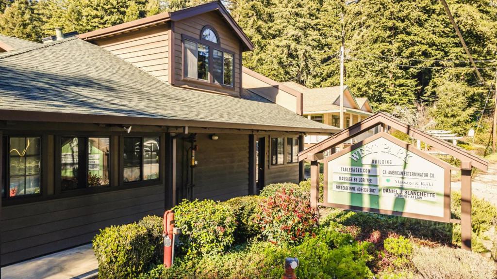 A stunning freestanding office building located in the charming town of Boulder Creek in San Lorenzo Valley, Santa Cruz County. Ideally situated on Highway 9, next to the fire department and directly across from the Boulder Creek Library, this well-maintained property features 8 office suites, 2 common-area bathrooms, 16 open parking spaces located behind the building and within the library lot, and a beautifully landscaped atrium courtyard with a central fountain. The building has been upgraded with a newer roof, fresh exterior paint, an updated HVAC system, and a fully compliant fire sprinkler system. It offers excellent street visibility and prominent signage. Currently, 4 stable tenants occupy 7 of the 8 offices. CA American Exterminators occupies 4 spaces, Attorney Daniel Blanchette occupies 1 space, and the other 2 spaces are occupied by massage therapists, 1 suite available for lease, or ideal for an owner-user seeking to occupy and invest in a desirable property in a great location.