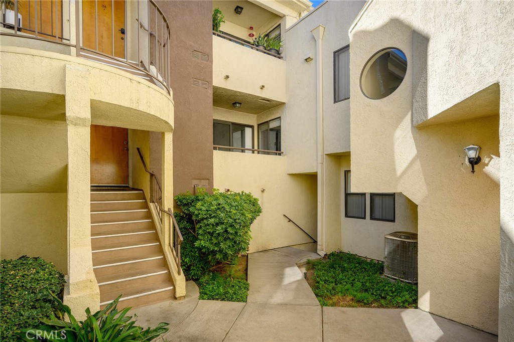 Top Floor Condo * Located In A Gated Community * Updated * 3 Bedrooms / 2 Bathrooms * 1,146sqft * 1987 Built * Living Room With Fireplace * Kitchen With Quartz Countertops & An Area For A Nook * Laminate Floors * Recessed Lighting * Central A/C & Heat * Patio * Laundry Hook-Ups In The Garage * 2 Car Tandem Parking * Community Pool & Spa * $480/m HOA