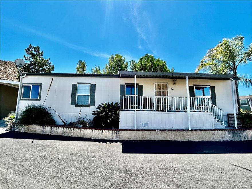 Welcome to this charming 3-bedroom, 2-bath home in a gated, all-age family park! Inside, you’ll find tile and laminate flooring throughout, ceiling fans in every room, and a spacious kitchen with a center island. The washer, dryer, and refrigerator are all included, making this home move-in ready.



The primary suite features a luxurious jetted soaking tub, a separate walk-in shower, and plenty of space to relax. Outside, enjoy a front patio with breathtaking mountain and valley views, a convenient wheelchair-accessible ramp in the carport, and a shed for extra storage.



The community offers fantastic amenities, including a swimming pool, spa, basketball court, barbecues, and playground—fun for all ages!



Book your showing today before it’s gone!