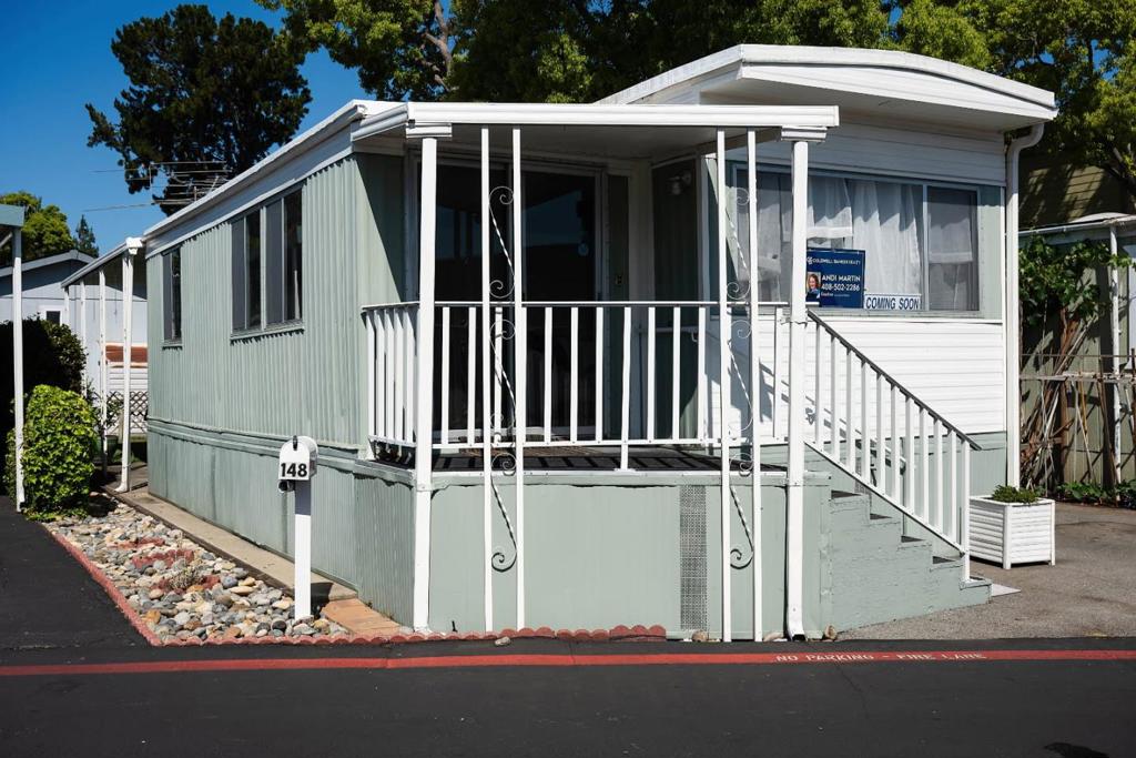 Welcome home to this charming 1-bedroom, 1 bath home located in the most desirable Park in Sunnyvale. Showing pride of ownership, this light and bright home has now been passed down through 2 generations. Cozy, yet open feeling home offers a welcoming and functional kitchen, perfect for preparing meals. Living and dining room are a combined l-shape, allowing for ease of movement and entertaining guests. Step inside to find new LVP flooring adding to the home's warm atmosphere. The living area Is open and perfect for entertaining guests. The laundry room for the complex is in the same row and is easily accessible. Backyard feature side deck with stairs to green grass, camellia bush which is over 30 years old, lemon tree, & more. Brand new laminate flooring throughout with the exception of master bedroom closet. New paint on ceilings, bathroom was fairly recently upgraded to have stall shower with low lip for easy entry & high quality wood look lvp flooring. all inspections are in. All questions are welcome. To qualify to purchase with Park management, Buyer must make 2.5 times space rent and have good credit history.