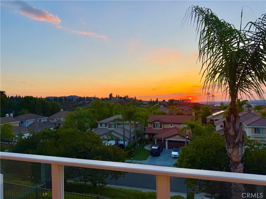 Discover this exceptional residence located on a quiet cul-de-sac in the desirable neighborhood of Anaheim Hills. Showcasing breathtaking cityscape and hillside vistas. This 4-bedroom, 2.5-bath home spans nearly 2,130 sq ft and has been thoughtfully upgraded to reflect today’s lifestyle trends. From the attractive curb appeal, you’re welcomed into an impressive entry with a stunning foyer and floating staircase. The formal living room, with soaring ceilings, enhances the sense of grandeur, while the elegant dining room provides a refined space for entertaining. The inviting family room, complete with a cozy fireplace, seamlessly connects to the kitchen. The upgraded kitchen features granite countertops with backsplash, gas cooktop and oven, microwave, and dishwasher—designed for both everyday living and special gatherings. Upstairs the primary suite offers sweeping views from the balcony and a beautifully remodeled bath with dual vanities, a soaking tub, walk-in shower, and walk-in closets. Three additional bedrooms complete the second level, along with a laundry room conveniently located on second floor with washer and dryer included. Step outside to a private backyard retreat with captivating hillside and city light views—perfect for relaxing or entertaining. Additional highlights include gorgeous laminate flooring throughout, all bathrooms remodeled, two-car garage with EV charger, ceiling fans and solar panels. Ideally located near top-rated schools, shopping, dining, Anaheim Hills Golf Course, Walnut Canyon Reservoir, and scenic trails. A remarkable property that perfectly blends style, comfort, and an enviable Anaheim Hills lifestyle—this home is not to be missed!