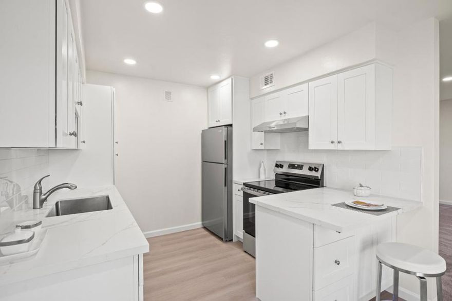 This bright, airy condo offers standout value in San Mateo. Enjoy a remodeled kitchen with white cabinetry, quartz countertops, and new flooring. Both updated bathrooms shine with modern tilework, new vanities, and sleek flooring. Recessed lighting and large windows keep every corner feeling light and welcoming. Move-in ready! 2 parking spots (1 carport) and storage included. This 2/2 is a corner unit with only one shared wall. The condo also includes the patio area in front of the condo perfect for plants, a little table, or a chair to enjoy the sun. Located near Los Prados Park and scenic waterway trails, youll enjoy easy access to local shops, cafés, and commuting routes to both San Francisco and Silicon Valley. All the updates you want, in a location that lets you live the Peninsula lifestyle effortlessly. Please note there are outdoor stairs up to the condo.