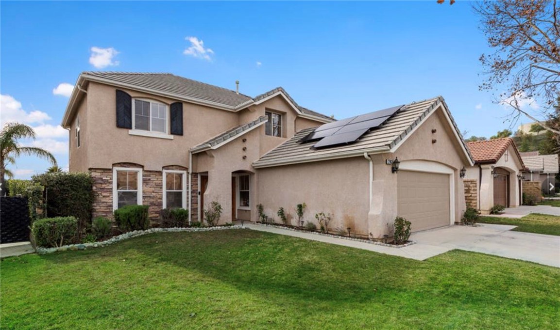 Don't miss this stunning Hasley Hills Canyon View home! Beautifully renovated, 3 bed, 3 bath plus loft with over 2300 sf of living space. Upgraded in 2021 throughout! Enter into the open concept first floor featuring fully appointed kitchen with large island and top of the line stainless steel appliances including Double oven, DW, Cooktop, dining room and Frig. The open living room, kitchen and Dining area has a custom gas fireplace, and bar area with wine frig. Perfect flow from the living space through double doors to the spacious landscaped backyard complete with Citrus trees, Custom pool and elevated spa with beautiful views on one of the largest lots in the community, perfect for entertaining and those summer bbq's. Upstairs you will find a multi purpose loft with built in bar, 2 guest beds and large primary suite with vaulted ceilings, walk in closet and en suite bath with spa tub and separate shower. Home is equipped with newer solar panels that bring your electric bill down to approx $60 a month. You will not find a better deal in this community. Just minutes away from Castaic Lake and Magic Mountain. This property is priced to sell with so many great features to this wonderful family home in a great neighborhood. Please contact us with any questions.