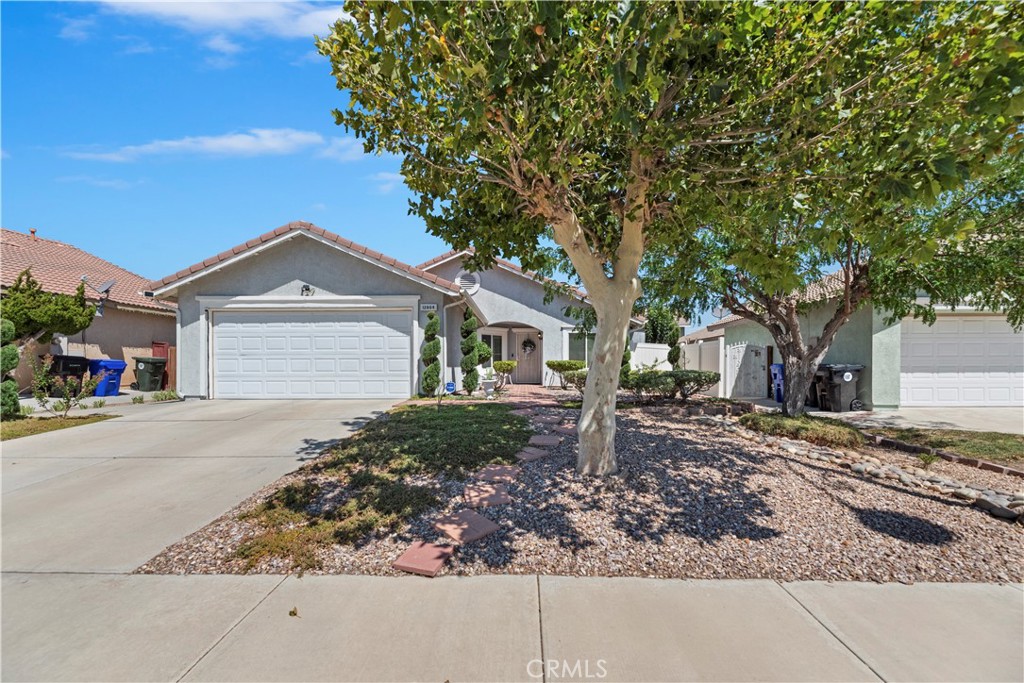 Welcome to this beautifully maintained 3-bedroom, 2-bath home in the desirable Eagle Ranch community of Victorville. Move-in ready and full of pride of ownership, this home features a functional, inviting layout perfect for everyday living. The upgraded kitchen boasts quartz countertops, a new microwave, and a stainless-steel sink. Outside, enjoy a fully landscaped front and backyard with low-maintenance AstroTurf, a spacious brick patio ideal for entertaining, and a versatile 12x18 ft shed with electricity—great for storage, a workshop, or a creative studio. A durable vinyl fence surrounds the entire yard, offering both privacy and curb appeal. Conveniently located near shopping, dining, schools, and major commuter routes, this home is an excellent choice for families, first-time buyers, or those looking to downsize. Don’t miss your chance to make it yours—schedule your showing today!