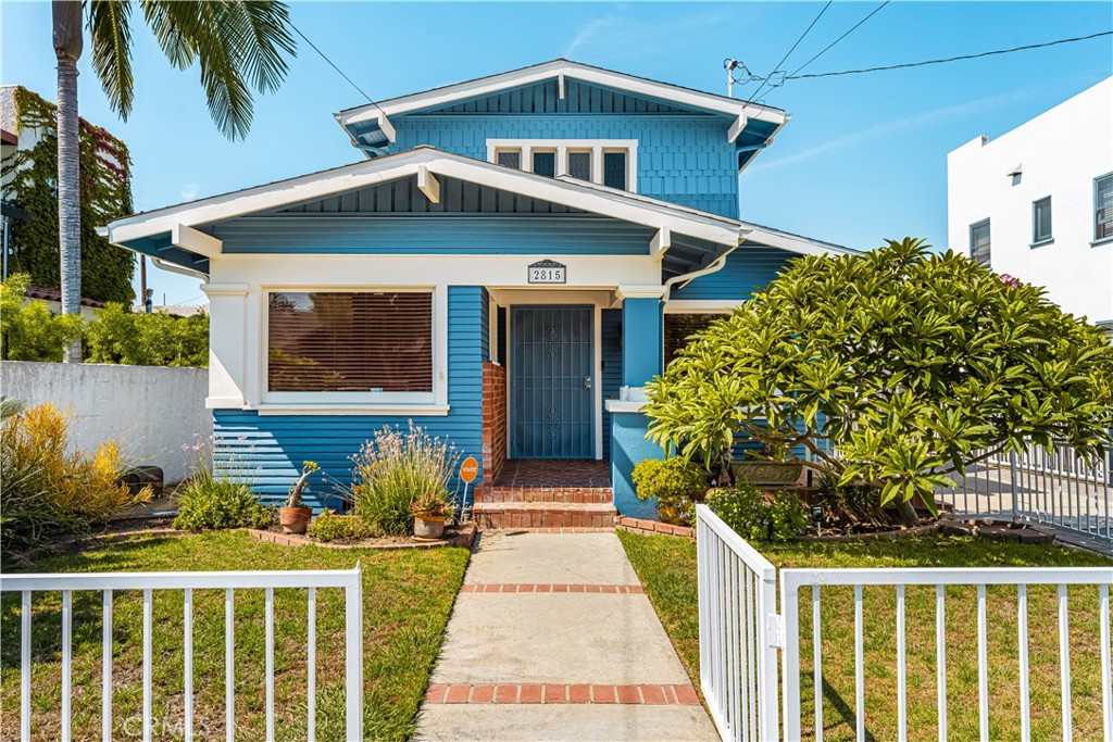 Imagine waking up just blocks from the beach, where fresh ocean breezes drift through the neighborhood. Step into this 1914 Craftsman infused with warmth and character — a place where love, laughter, and unforgettable meals are shared with family and friends. Inside, timeless details meet modern convenience: original crown moldings, rich wood floors, and a chef’s kitchen with professional GE Monogram appliances. High-BTU burners and double ovens inspire culinary creativity, whether preparing intimate dinners or hosting lively gatherings that fill the home with joy.
Outdoors, your private sanctuary awaits. Bamboo frames the yard with natural privacy, a Buddha fountain offers a calming backdrop for yoga or meditation, and fruit trees — Meyer lemon, mandarin, and passion fruit — invite you to harvest fresh ingredients for meals or cocktails. As twilight falls, string lights cast a golden glow across the garden, where you can savor wine, conversation, and tranquility in your own retreat. Tandem parking for up to five cars adds rare practicality in this sought-after neighborhood.
Within five blocks you’ll find the ocean, grocery stores, dispensaries, and countless neighborhood conveniences. This is not a cookie-cutter community — it’s authentic Long Beach, where historic homes, multi-family units, and local businesses coexist in a vibrant, eclectic fabric. It’s a lifestyle for those who value culture, walkability, and affordability.
Beyond your doorstep lies Retro Row, celebrated for its diversity, creativity, and authenticity. More than 40 independent shops and restaurants line this lively district — vintage boutiques, mid-century furniture stores, cozy coffee shops, wine bars, and family-owned eateries. Highlights include Michelin-starred dining at Heritage, James Beard–recognized Gusto Bread (voted one of the best bakeries in the U.S.), the Long Beach LGBTQ+ Center, the beloved Lola’s Mexican Cuisine, and countless hidden gems.
Modern upgrades make life effortless: insulation in all exterior walls and attic, a radiant barrier, and a three-year-old Cool Roof with a 30-year transferable warranty, providing year-round comfort and lower energy use. Additional updates include a mini-split in the upstairs bedroom and a 240V ChargePoint EV charger. Pre-appraised at $1,539,000 (report available in Supplements), this home blends preserved historic character with thoughtful modern improvements.