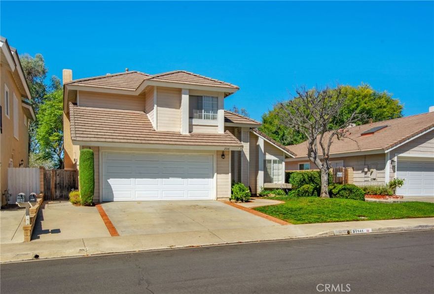 Experience the best of Robinson Ranch living —a beautiful two-story home perfectly positioned on a quiet street just steps from parks, playgrounds, and the community pool. This spacious residence features 4 bedrooms, all conveniently located upstairs, and 2.5 bathrooms across approximately 1,700 square feet, offering an ideal layout for families and modern lifestyles.

Step inside to discover soaring cathedral ceilings, designer finishes, and abundant natural light throughout the inviting living and dining spaces. The family room boasts a cozy fireplace, while the open kitchen is equipped with a breakfast nook and ample storage, making it the heart of the home.

Retreat to a generous primary suite, complete with a scenic view of city lights and rolling hills, dual sinks, soaking tub, and separate shower—perfect for unwinding after a busy day. Each bedroom comes with mirrored wardrobes and contemporary fixtures, ensuring comfort and style.

Outdoor living is yours in the landscaped backyard featuring a covered patio, and lawn—ideal for entertaining or relaxing with loved ones. Enjoy direct garage access, room for four-car parking, and practical amenities including central air, forced air heating, laundry hookups for both gas and electric dryers, and low Mello Roos and HOA fees.

With top-rated Saddleback Valley schools and vibrant neighborhood amenities just a short walk away, this outstanding property delivers the quintessential California lifestyle in a sought-after Robinson Ranch location. Don’t miss the opportunity to make this move-in ready home yours!
