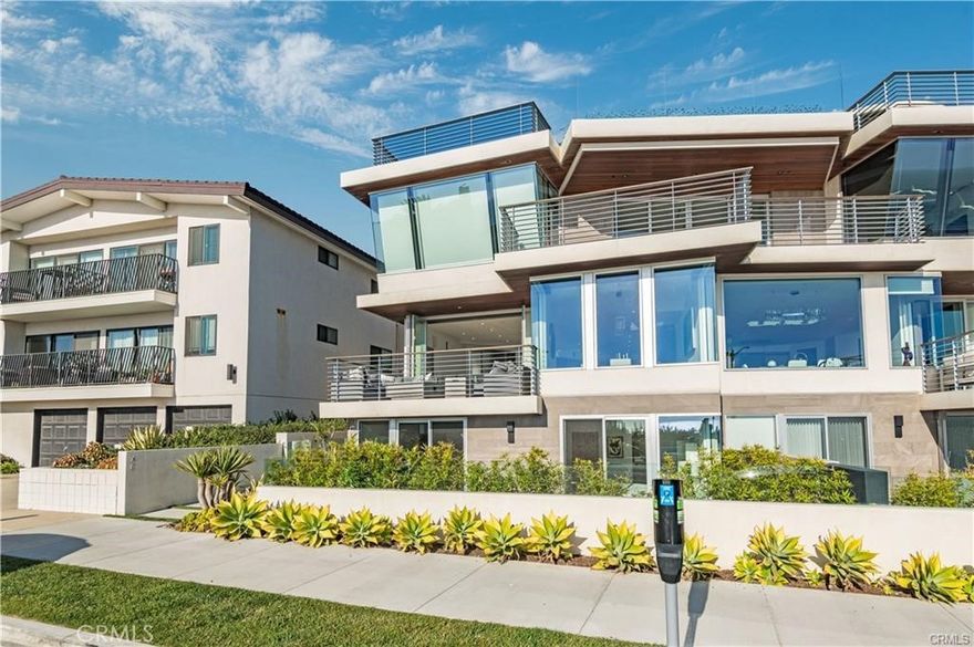 Lavishly Luxurious Condo with Breathtaking Ocean Views! Idyllically situated in a three-unit
building, this 3BR/2BA, 1,950sqft first-row residence offers a feast for the senses with gorgeous
contemporary architecture and lush tropical landscaping. Recently built in 2017 and thoughtfully
designed by renowned designer, Kimberly Colletti, the interior captures the essence of chic
modern living with an open concept floorplan, oversized windows, premium finishes, beautiful
wood flooring, recessed lighting, and an expansive great room with a custom fireplace. Equipped
to satisfy even the most discerning, the open concept gourmet kitchen features top-of-the-line
stainless-steel appliances (Wolf and Sub-Zero), cabinetry, a breakfast bar, a wine cellar/wet bar,
and a glamorous dining area with a chandelier. Explore further to discover an oversized primary
bedroom with ample closet space and an ultra-luxe en suite boasting a standalone soaking tub, a
glass enclosed shower, and a dual sink vanity. Two additional bedrooms are generously sized,
while both guest bathrooms impress with lavish style and superior function. Unsurpassed
entertaining possibilities abound in the fully enclosed backyard, which has a built-in BBQ and a
lovely conversation area. Savor the glorious sunset views over the Pacific on your sprawling
oceanfront deck. Other features: attached 2-car garage, laundry area, security system, SMART
home technology, close to trendy dining and shops, and more! Call now for a tour!