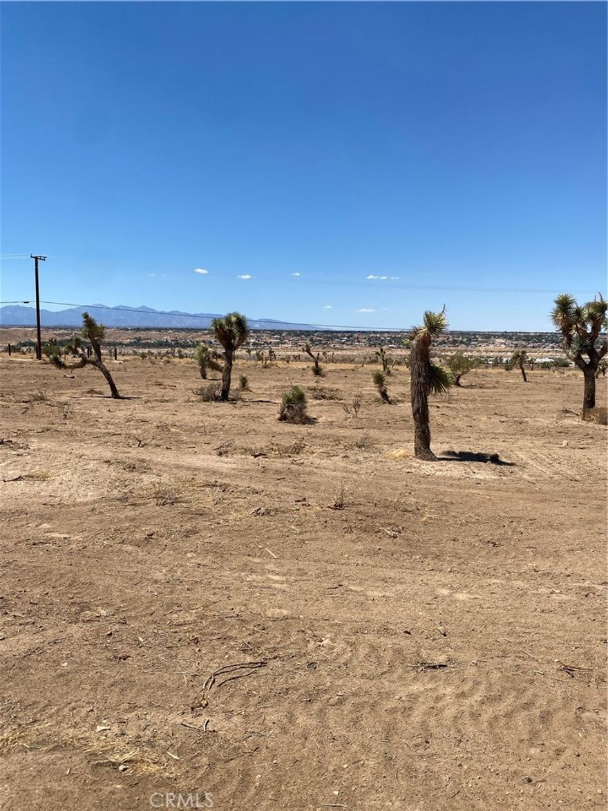 Exceptional piece of 5 acre land that don't come on the market often.  It is located high on the Hillside with spectacular 360 degree views east of Hesperia overlookingthe Mojave River, Hesperia and Apple Valley,  Property would make a Great Ranch Estateor an Excellent Development for high end home. There are many trails in the area for horses and recreational vehicles. Electricity pols are on the property, come check out this amazing view.