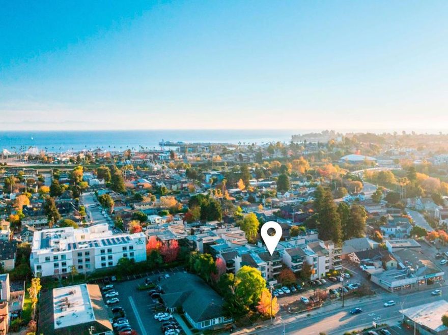 This prime, top-floor corner condo delivers the quintessential Santa Cruz lifestyle: bright, breezy, connected, and effortlessly coastal. Wake up to sunlit interiors and enjoy slow mornings on your private balcony, sipping coffee as downtown comes alive beneath you. Inside, updated floors, refreshed bathrooms, and a cozy fireplace create a crisp, inviting backdrop for both everyday living and relaxed evenings in. A gated entry and secure underground parking add peace of mind, while everything you love about Santa Cruz sits just moments away. Walk or bike to Pacific Avenue's restaurants and shops, grab groceries at Trader Joes, or wander down to the Boardwalk and sandy shoreline whenever the mood strikes. When it's time to unwind, the community pool and hot tub offer the perfect reset. For anyone seeking convenience without sacrificing charm, style, or access to the beach, this condo captures the very best of downtown living, wrapped in the coastal energy that defines Santa Cruz.