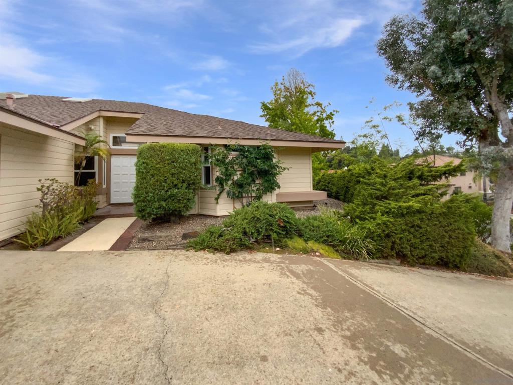 Welcome to this beautifully maintained property, boasting a neutral color paint scheme and fresh interior paint. The living room is adorned with a cozy fireplace, perfect for chilly evenings. The kitchen is a chef's dream, equipped with all stainless steel appliances and a center island for additional prep space. The primary bedroom features a spacious walk-in closet, while the primary bathroom offers double sinks for convenience. Step outside to a covered patio, perfect for outdoor dining, and a deck overlooking a fenced-in backyard. This home is a true gem, offering a perfect blend of comfort and style.