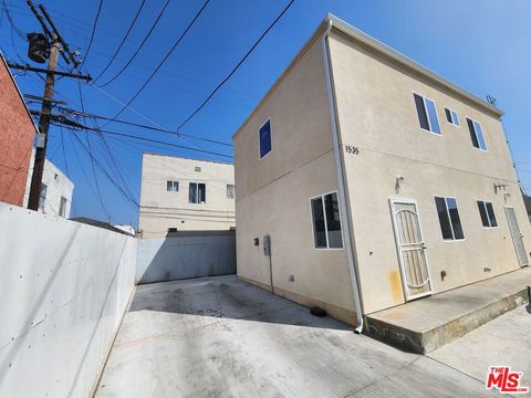 Photo of 1535 W 80th Street, Los Angeles, CA 90047 (MLS # 26668883)