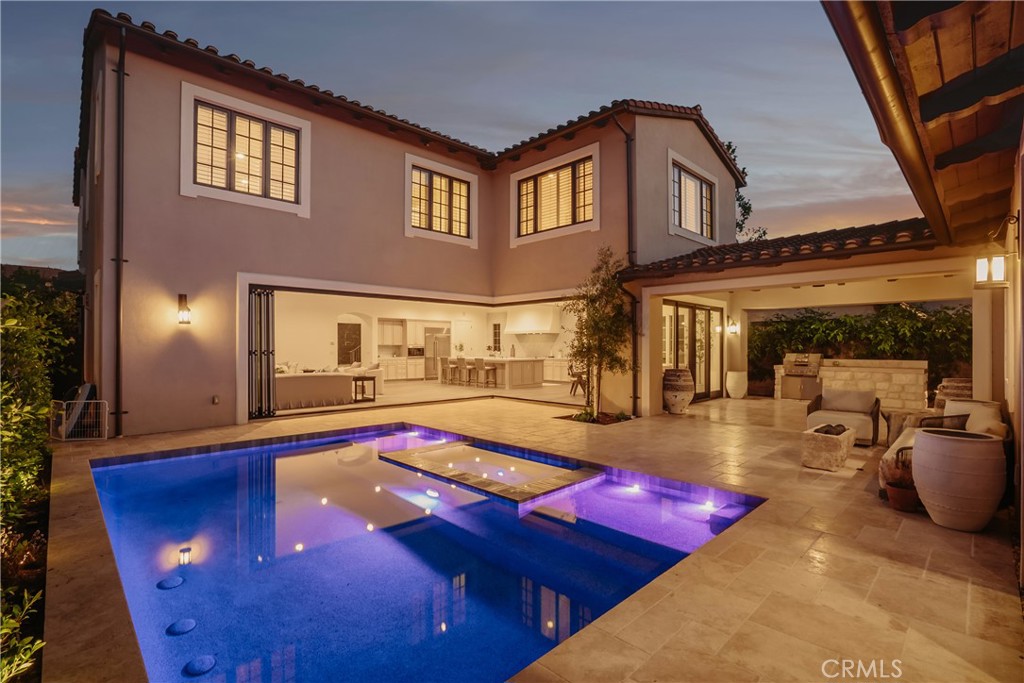 Welcome to the elegant community of “The Groves” of Orchard Hills with 24 HR Security Guard. Discover quality craftsmanship and contemporary elegance in this stunning residence, ideally located on a south- North facing lot in the sought-after community of Orchard Hills. Special features including a separately entry of guest/in-law/ casita house with a bedroom, a bathroom, kitchen, laundry room and direct courtyard access. Also features: bi-fold doors, upscale stainless appliances, main floor bedroom, family study room, a spacious master suite with retreat/office/gym; Heated saltwater pool and spa with led custom lighting, AGA stove with custom handcrafted hood, and custom master closet by California closets; Upgraded whole house cabinetry, plantation shutters, interior solid core doors, instant hot water system, and two HOA facilities with club house, swimming pool, spa, much more. The children can attend award winning Orchard Hills schools from K to 8 at walking distance.